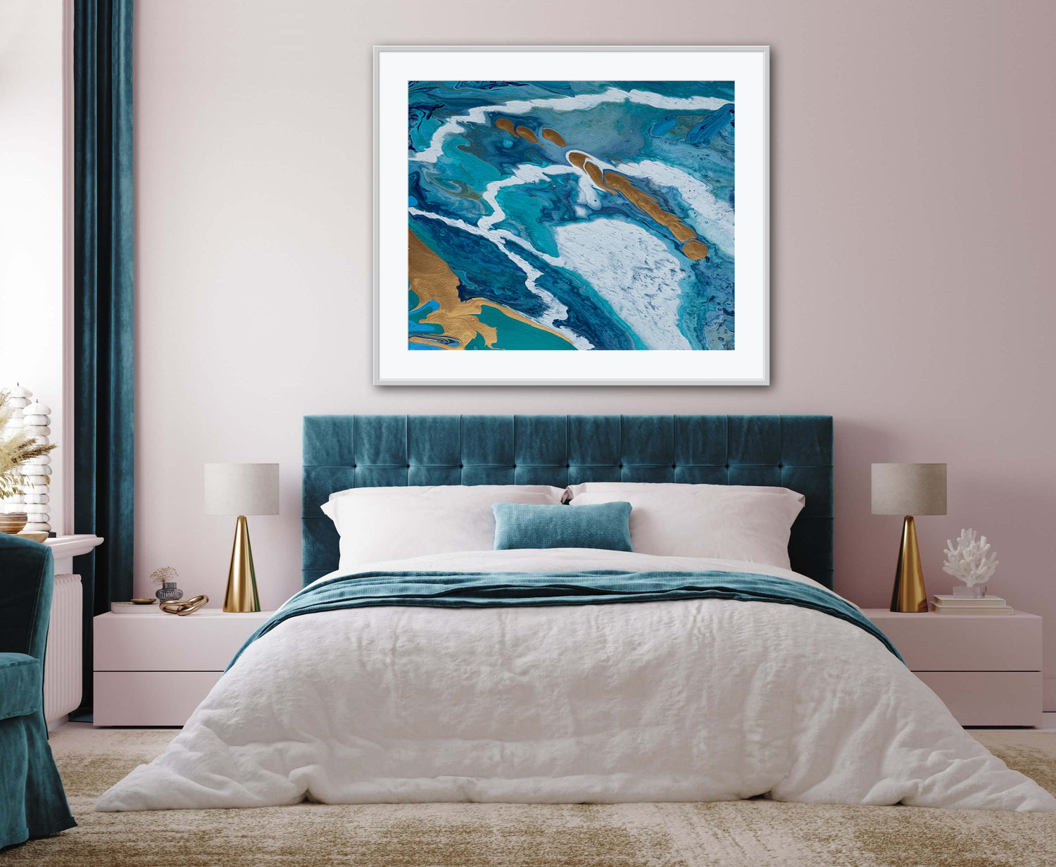 Abstract print in aqua, blue. white, green and gold framed with white mat and gold frame. Print placed in bedroom with emerald headboard and curtains, with white bedding.