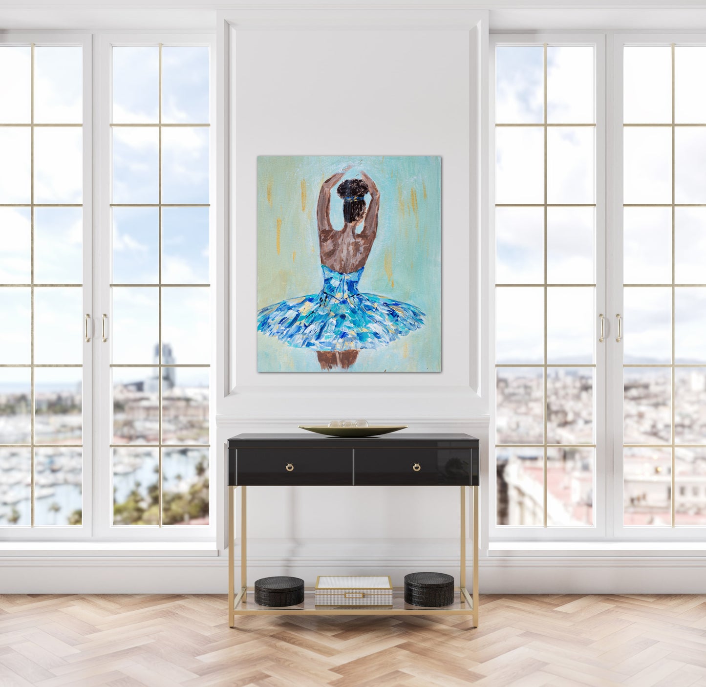 Print featuring black or african american ballerina in blue, aqua, white and gold tutu with soft green background with gold accents in hallway with black hallway table.